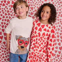 A girl and a boy wearing Boden clothes